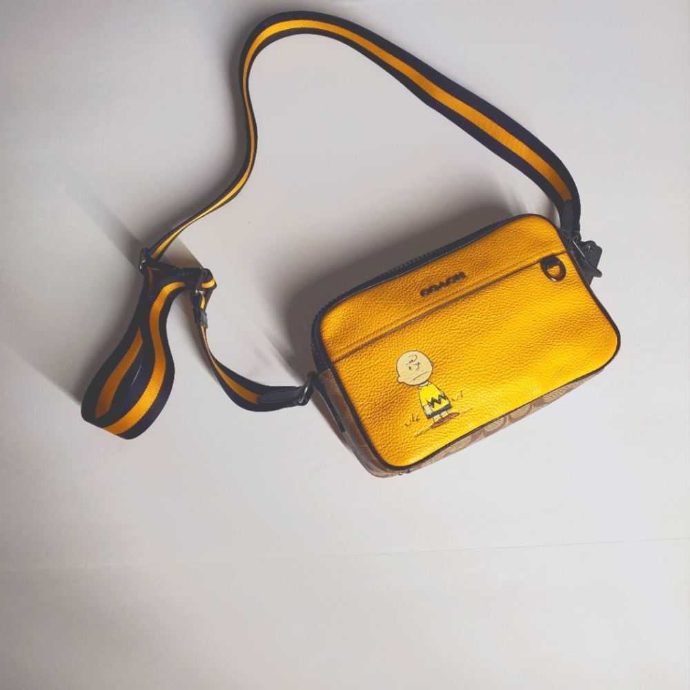Coach x Peanuts Charlie Brown crossbody camera bag